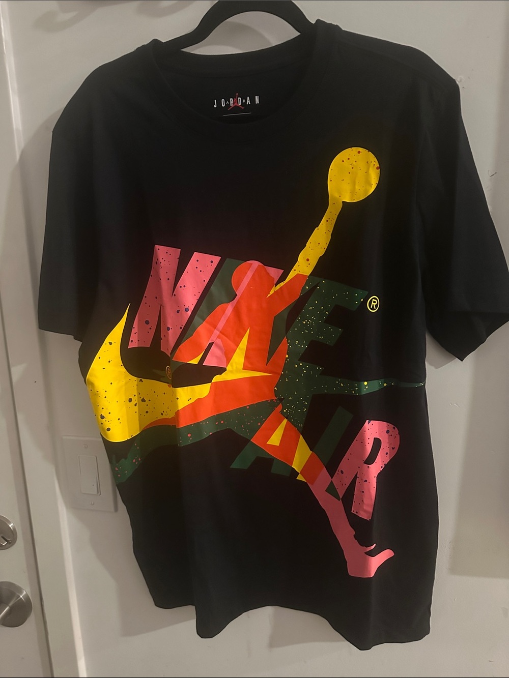 Jordan Black Tee with Yellow, Pink and Green Jumpman Graphic